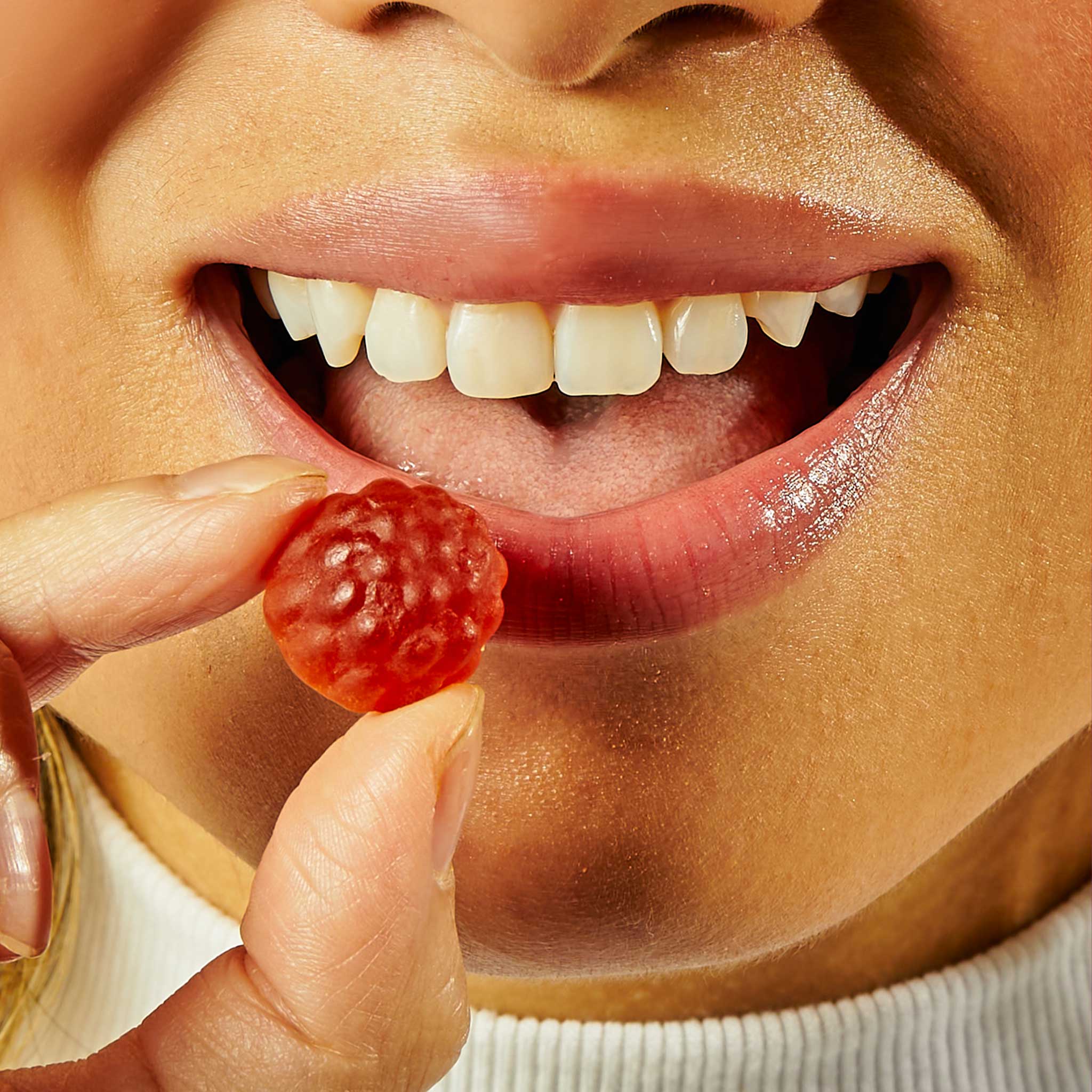Woman Eating Reishi Gummy