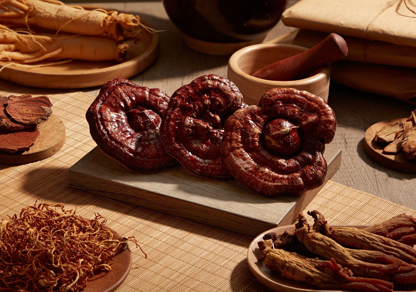 A group of fresh mushrooms on a cutting board, with a close-up view highlighting their texture, suggesting use in cooking or as a snack.